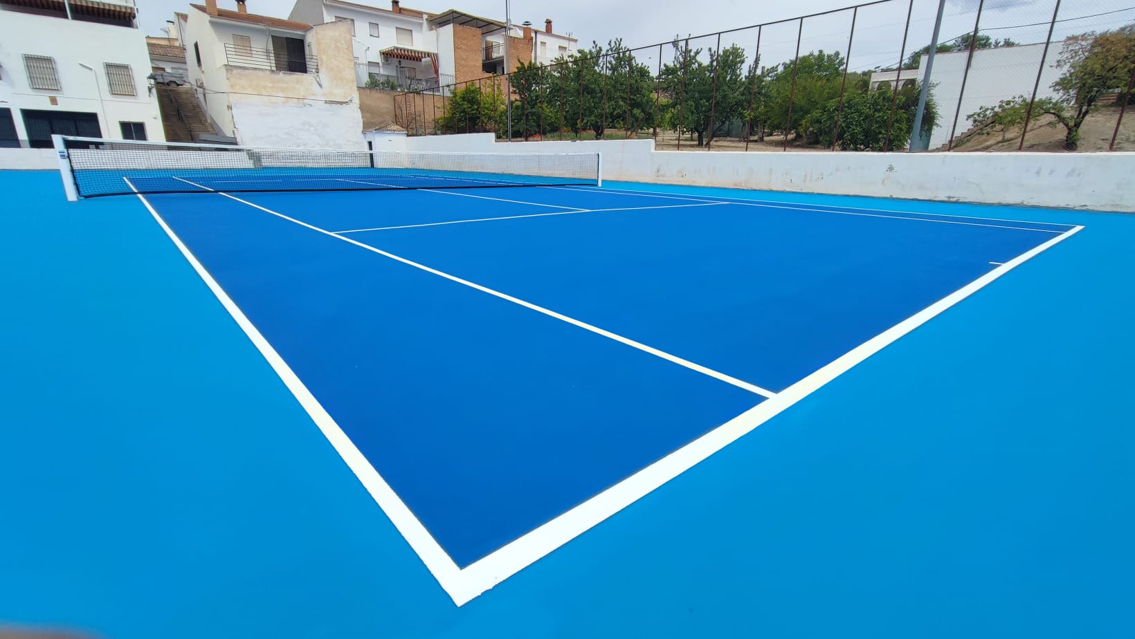 pista de tenis de resinas acrílicas